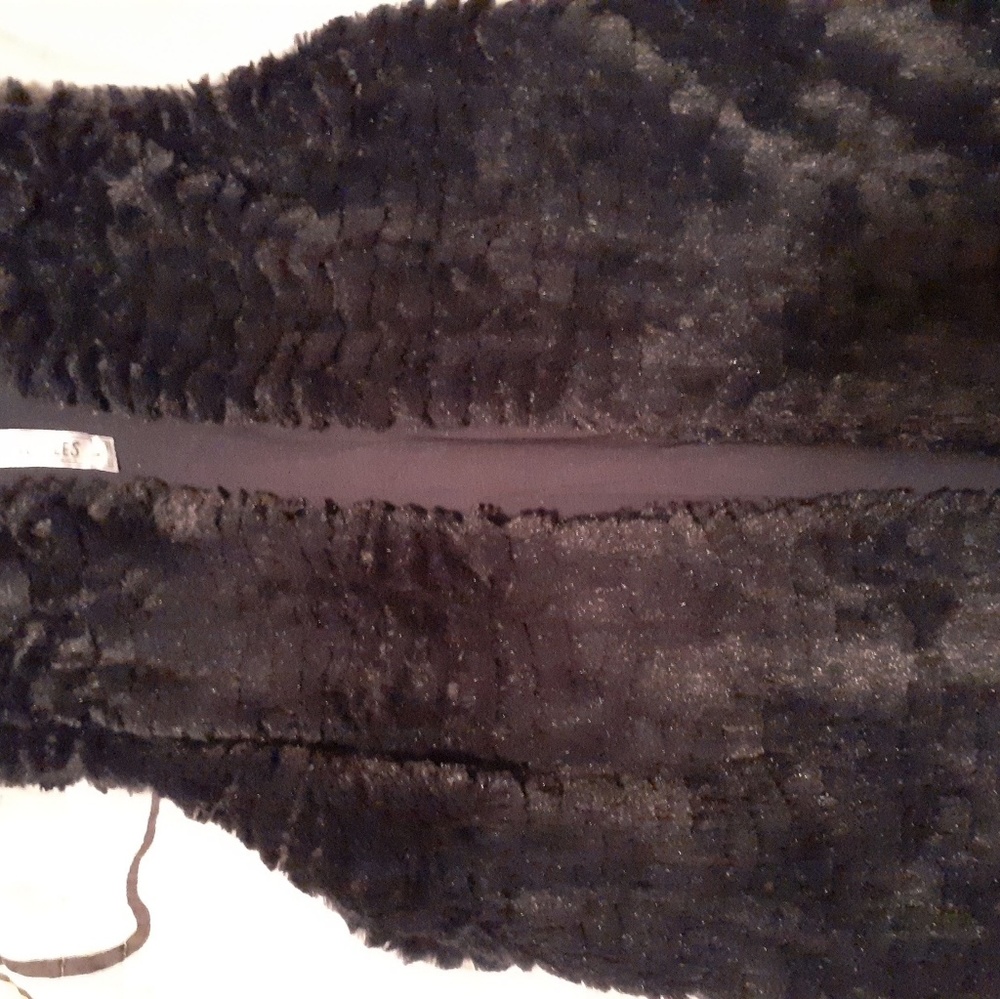 Beautiful, soft girls sleeveless vest like top.